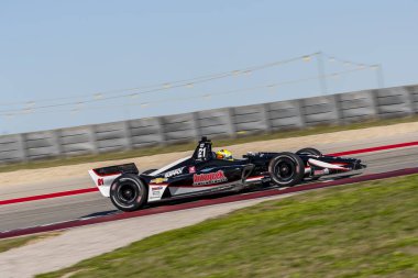 Spencer Pigot (21) Amerika Devlet uygulamaları sırasında döner devre Of Americas Austin, Teksas, IndyCar bahar Test için geçer.
