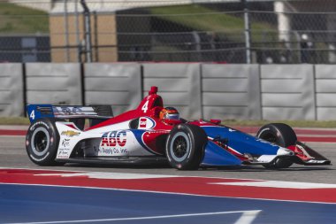 Matheus Leist (4) Brezilya uygulamaları sırasında döner devre Of Americas Austin, Teksas, IndyCar bahar Test için geçer.