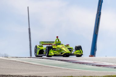 Simon Pagenaud (22) Fransa'nın uygulamaları sırasında döner devre Of Americas Austin, Teksas, IndyCar bahar Test için geçer.