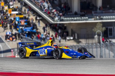 Alexander Rossi (27) Amerika Birleşik Devletleri'nin uygulamaları sırasında döner devre Of Americas Austin, Teksas, IndyCar bahar Test için geçer.