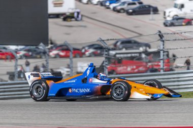Scott Dixon (9) Yeni Zelanda döner uygulamaları sırasında devre Of Americas Austin, Teksas, IndyCar bahar Test için geçer.