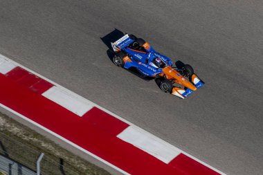 Scott Dixon (9) Yeni Zelanda döner uygulamaları sırasında devre Of Americas Austin, Teksas, IndyCar bahar Test için geçer.