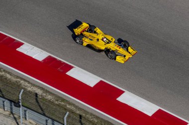 Helio yasaklanmış (3) Brezilya uygulamaları sırasında döner devre Of Americas Austin, Teksas, IndyCar bahar Test için geçer.