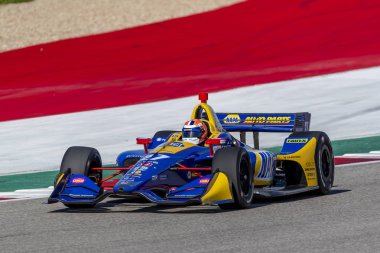 Alexander Rossi (27) Amerika Birleşik Devletleri'nin uygulamaları sırasında döner devre Of Americas Austin, Teksas, IndyCar bahar Test için geçer.