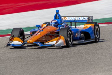 Scott Dixon (9) Yeni Zelanda döner uygulamaları sırasında devre Of Americas Austin, Teksas, IndyCar bahar Test için geçer.