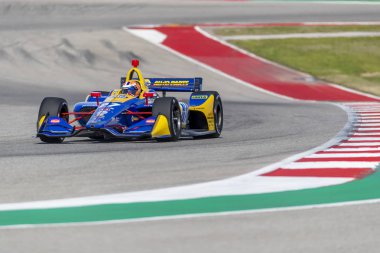 Alexander Rossi (27) Amerika Birleşik Devletleri'nin uygulamaları sırasında döner devre Of Americas Austin, Teksas, IndyCar bahar Test için geçer.