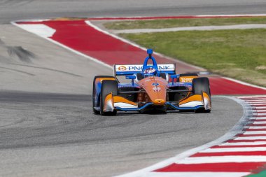 Scott Dixon (9) Yeni Zelanda döner uygulamaları sırasında devre Of Americas Austin, Teksas, IndyCar bahar Test için geçer.