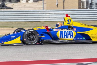 Alexander Rossi (27) Amerika Birleşik Devletleri'nin uygulamaları sırasında döner devre Of Americas Austin, Teksas, IndyCar bahar Test için geçer.
