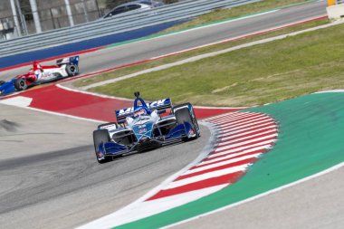 Takuma Sato (30) Japonya'nın uygulamaları sırasında döner devre Of Americas Austin, Teksas, IndyCar bahar Test için geçer.