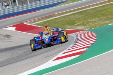 Alexander Rossi (27) Amerika Birleşik Devletleri'nin uygulamaları sırasında döner devre Of Americas Austin, Teksas, IndyCar bahar Test için geçer.