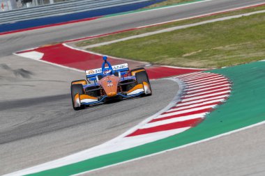 Scott Dixon (9) Yeni Zelanda döner uygulamaları sırasında devre Of Americas Austin, Teksas, IndyCar bahar Test için geçer.