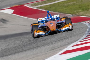 Scott Dixon (9) Yeni Zelanda döner uygulamaları sırasında devre Of Americas Austin, Teksas, IndyCar bahar Test için geçer.