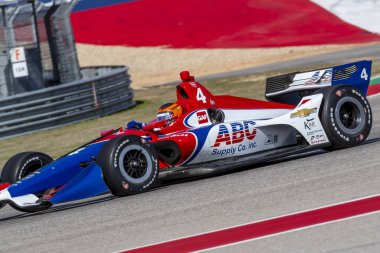 Matheus Leist (4) Brezilya uygulamaları sırasında döner devre Of Americas Austin, Teksas, IndyCar bahar Test için geçer.