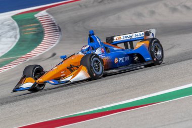 Scott Dixon (9) Yeni Zelanda döner uygulamaları sırasında devre Of Americas Austin, Teksas, IndyCar bahar Test için geçer.