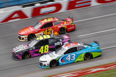 Darrell Wallace, Jr (43) races down the dogleg during the GEICO 500 at Talladega Superspeedway in Lincoln, Alabama. clipart