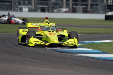 Montmorillon, Fransa 'dan SIMON PAGENAUD (22) Indianapolis, Indiana' daki Indianapolis Motor Yarış Pisti 'ndeki GMR Grand Prix yarışında virajlarda yarışır..