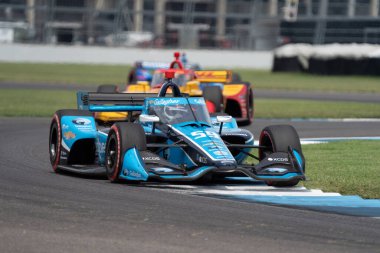 Indianapolis, Indiana 'daki Indianapolis Motor Yarış Pisti' nde yapılan GMR Grand Prix yarışı sırasında İngiltere 'nin 59 yaşındaki MAX CHILTON (59) virajlardan geçmektedir..