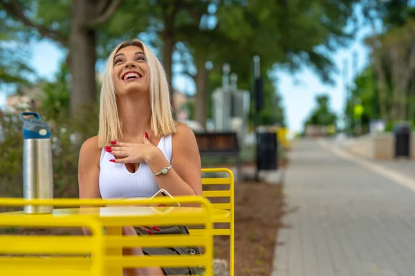 Gorgeous Young Blonde Model Poses Outdoors While Enjoying Summer Day — стоковое фото