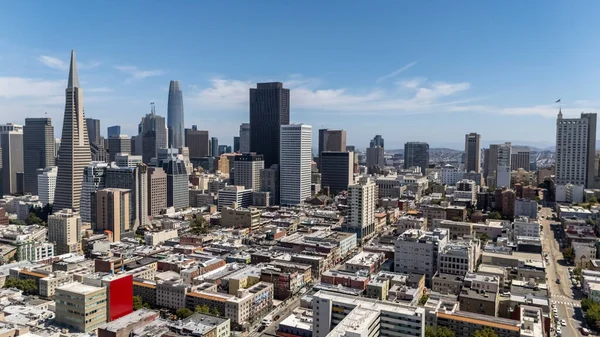 SAN FRANCISCO, CA USA - July 28, 2025:  An aerial view of San Francisco reveals a vibrant cityscape of rolling hills, diverse architecture, and iconic landmarks nestled along the edge of the Pacific coast.