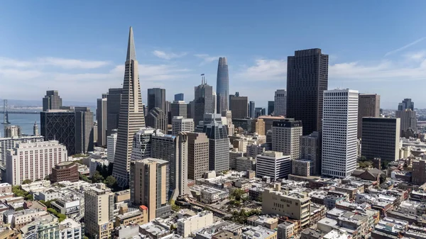 SAN FRANCISCO, CA USA - July 28, 2025:  An aerial view of San Francisco reveals a vibrant cityscape of rolling hills, diverse architecture, and iconic landmarks nestled along the edge of the Pacific coast.
