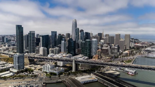 SAN FRANCISCO, CA USA - July 28, 2025:  An aerial view of San Francisco reveals a vibrant cityscape of rolling hills, diverse architecture, and iconic landmarks nestled along the edge of the Pacific coast.