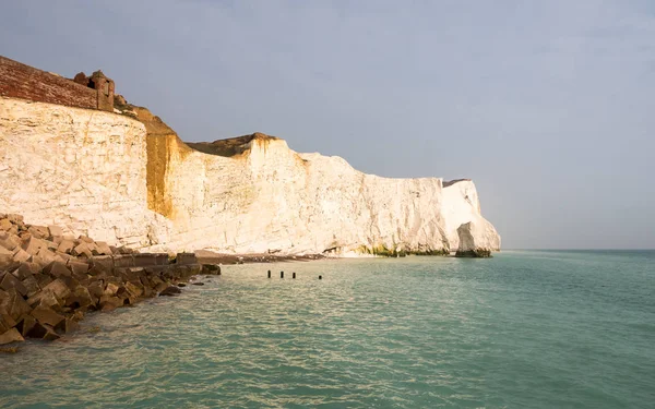 Chalk cliffs of the South Downs, East Sussex, England. The iconic chalk cliffs of the Sussex South Downs on England\'s southern coast on a calm dusky evening.