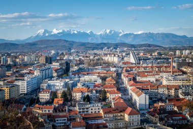 View from castle over Ljubljana to mountain range Kamnik–Savin clipart