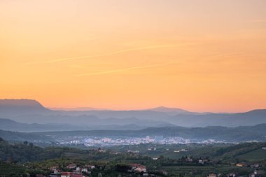 Sunrise view over wine region Brda to town Nova Gorica