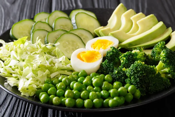 Colored Diet Green Salad Fresh Avocado Peas Cabbage Cucumber Eggs — Stock Photo, Image