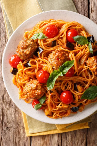 Spaghetti Meat Balls Vegetables Tomato Sauce Close Plate Table Vertical — Stock Photo, Image