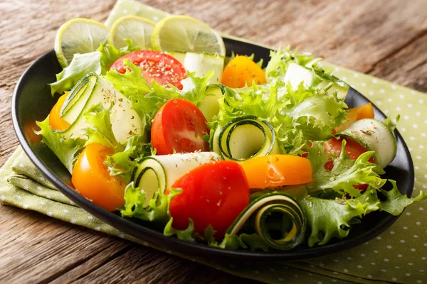 Salad Zucchini Tomatoes Lettuce Lime Spices Dressed Olive Oil Close — Stock Photo, Image