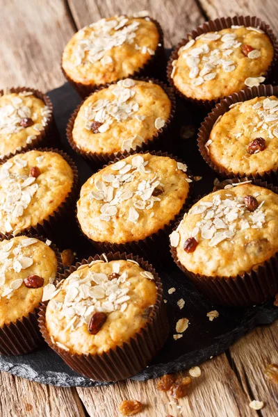 Delicious Muffins Oatmeal Raisins Close Table Vertica — Stock Photo, Image