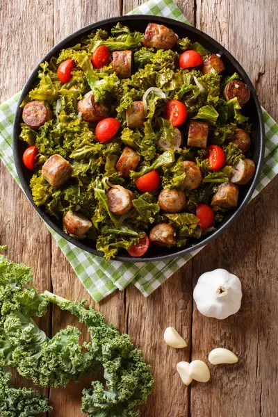 Kale Grilled Sausages Fresh Tomatoes Garlic Close Plate Table Vertical — Stock Photo, Image