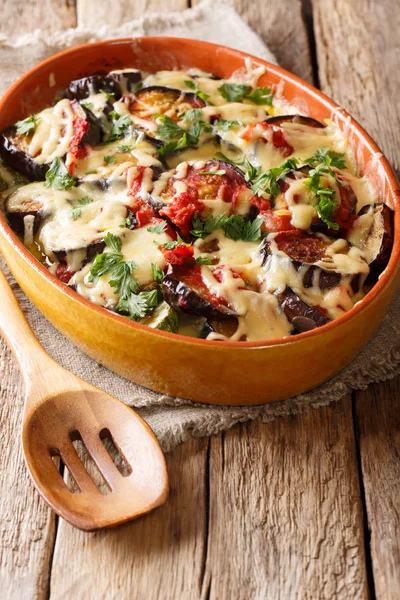 Summer recipe for eggplant casserole with tomatoes, herbs and ch