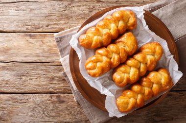 Geleneksel Koeksisters Güney Afrikalı yapışkan halka tatlı, yapışkan