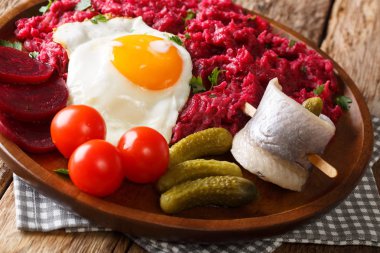 traditional Labskaus recipe of potato, corned beef and beet with clipart