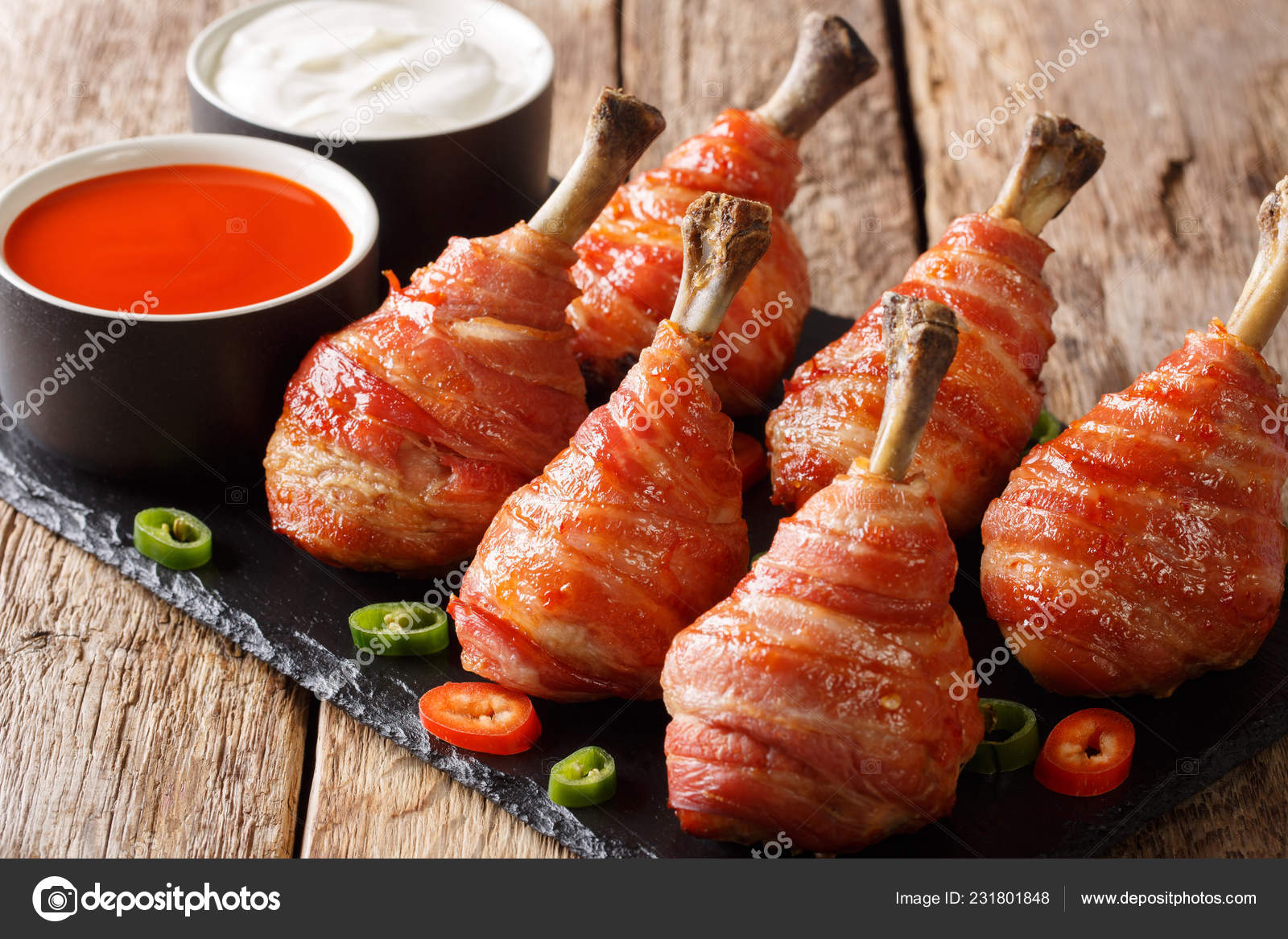 Traditional Lollipops chicken legs wrapped in bacon served with
