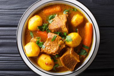 Lezzetli organik Afrika Kuzu güveç sebze yakın çekim içinde bir bo ile