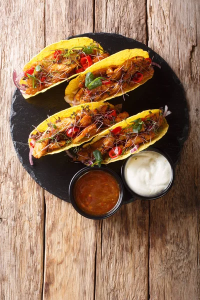 Delicious tacos stuffed with glazed chicken, microgreen and vege — Stock Photo, Image