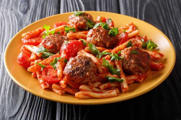 Delicious Italian meatballs with Casarecce pasta and tomato sauc — Stock Photo, Image
