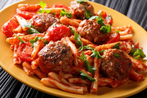 Homemade Casarecce pasta with meatballs, herbs and cheese in tom — Stock Photo, Image