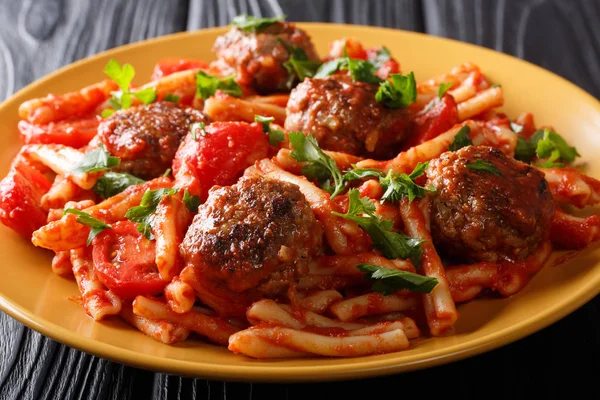 Italian pasta Casarecce with meat balls in tomato sauce closeup — Stock Photo, Image