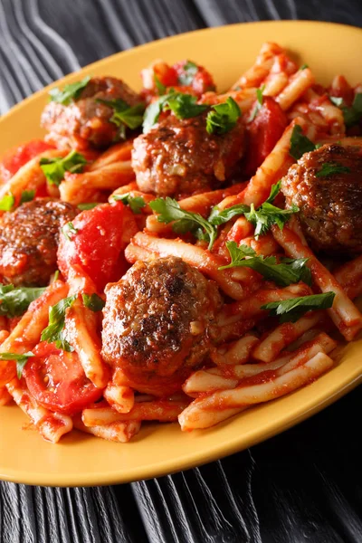 Serving pasta Casarecce with meat balls seasoned with tomato sau — Stock Photo, Image