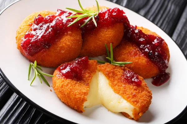 Fried Camembert breaded filed with cranberry sauce and rosemary — Stock Photo, Image