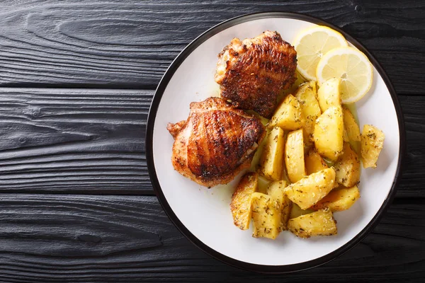 Greek food chicken thighs grilled with fried lemon garlic oregan