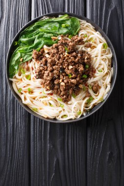 recipe for�dan dan noodles�with minced meat and greens closeup i