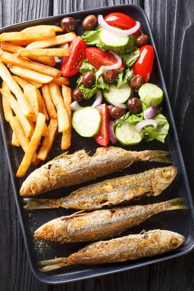 Fried Mediterranean Boops boops fish served with fresh salad and — Stock Photo, Image