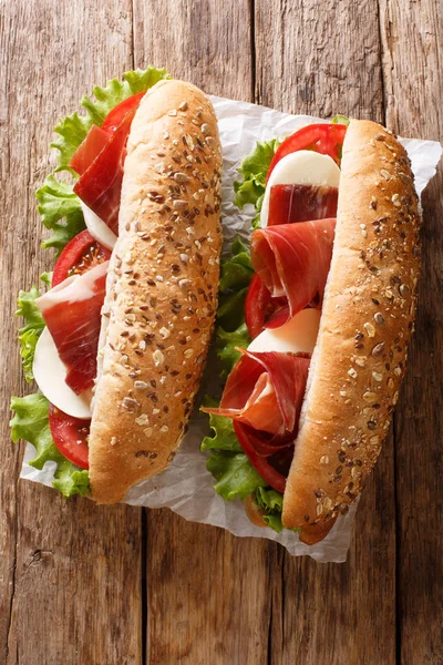 Mediterranean sandwiches with jamon, mozzarella cheese, tomatoes — Stock Photo, Image