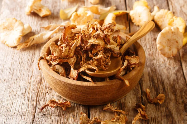 Natural ingredient dried wild chanterelle mushrooms close-up on