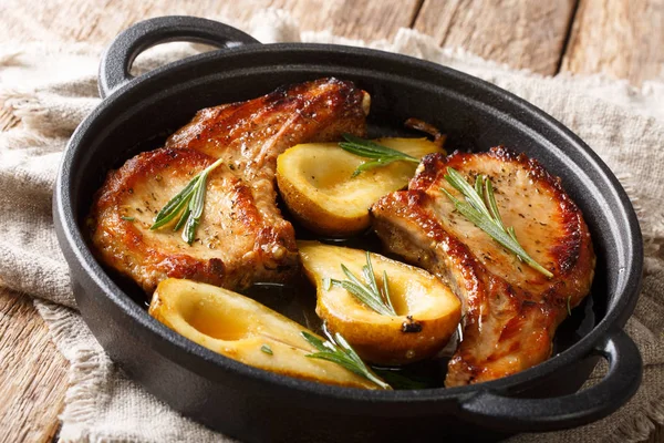 Rustic style baked pork chops with pears and rosemary in honey-g — Stock Photo, Image